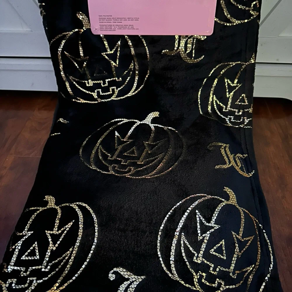 Juicy Couture Black and Gold Jack-o’-lantern Plush Throw Blanket